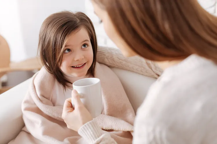 Child drinking herbal tea